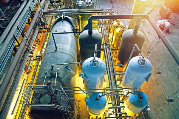Amine treatment in oil and gas industry